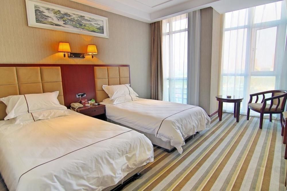 Meijing Business Hotel Чжэнчжоу Экстерьер фото