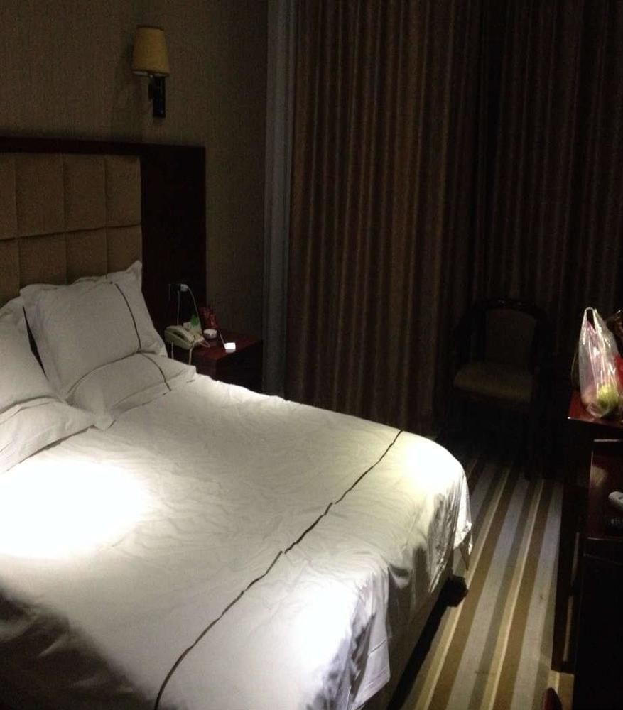 Meijing Business Hotel Чжэнчжоу Экстерьер фото