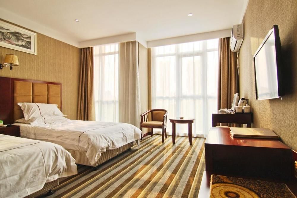 Meijing Business Hotel Чжэнчжоу Экстерьер фото