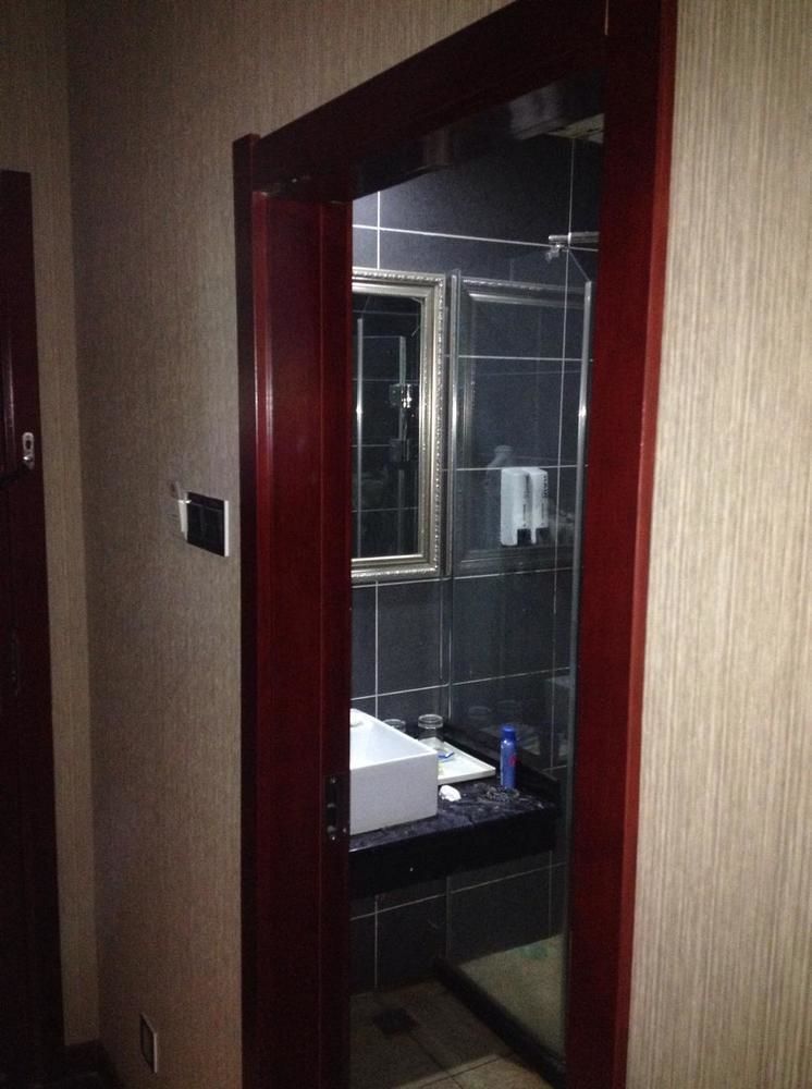 Meijing Business Hotel Чжэнчжоу Экстерьер фото